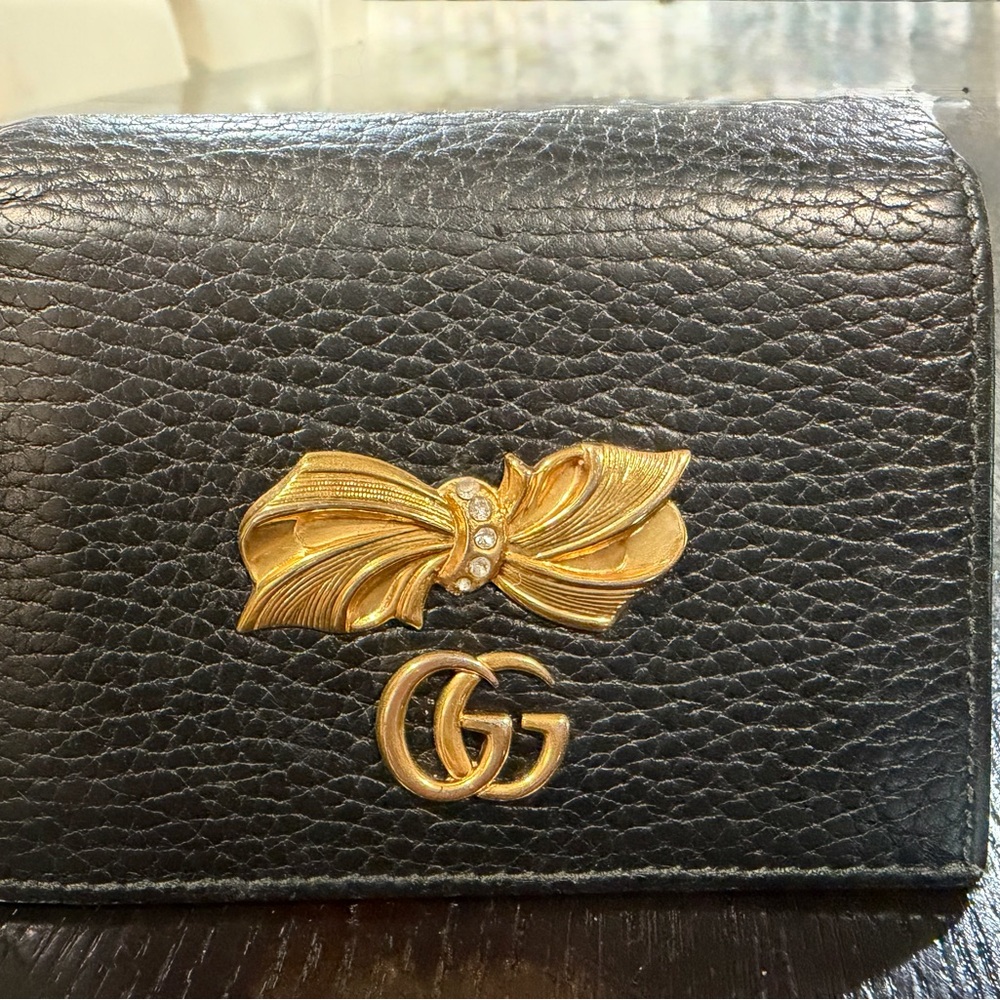 Authentic Gucci Black Compact Wallet with Gold Bow Detail